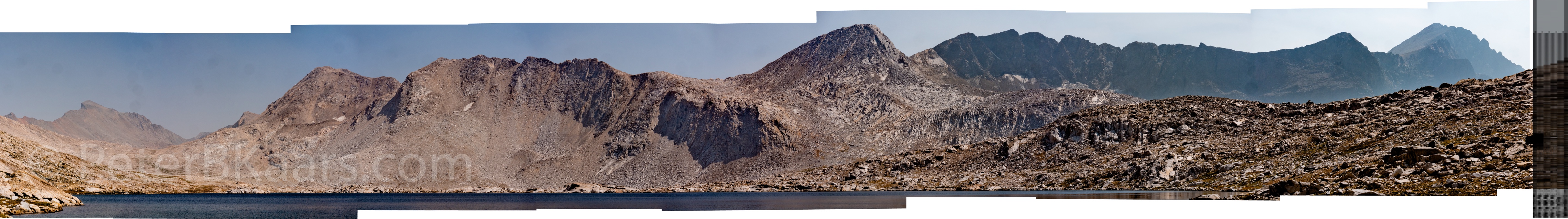 A landscape with hills and a body of water in the background

Description automatically generated with low confidence